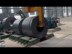 The carbon steel coil that has just been lifted down by the machine