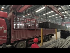 The stainless steel pipe being lifted and loaded onto the vehicle